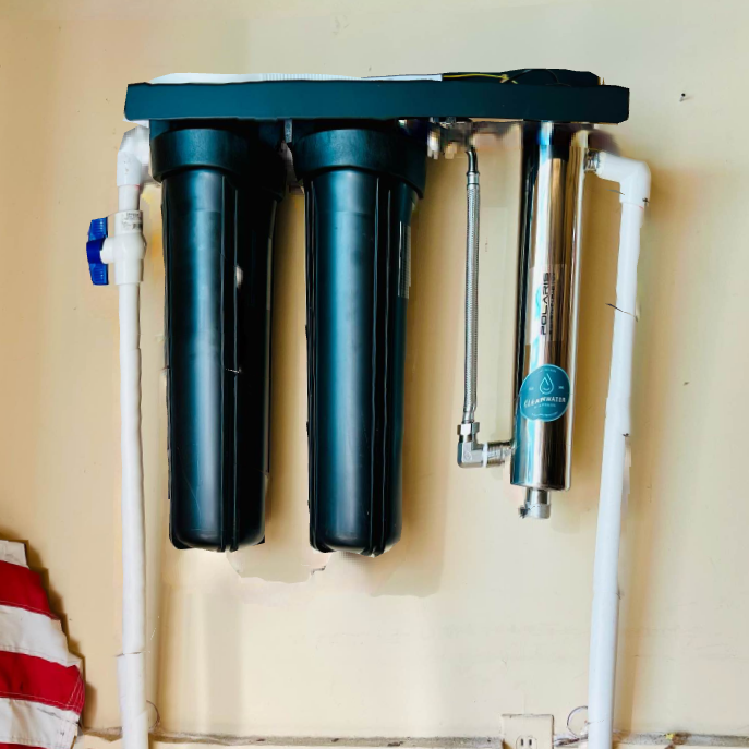 A whole-home water filtration and UV system installed and running in a central Mississippi home